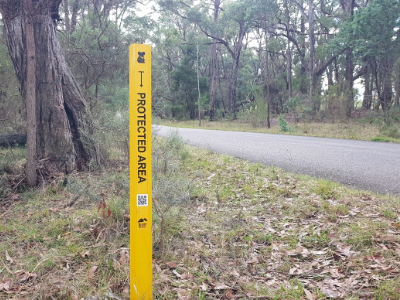 Roadside conservation guide post - protected area